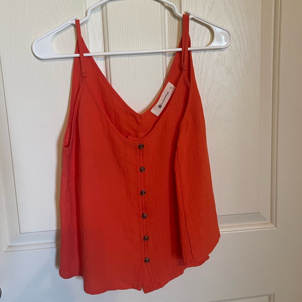 Orange button down top